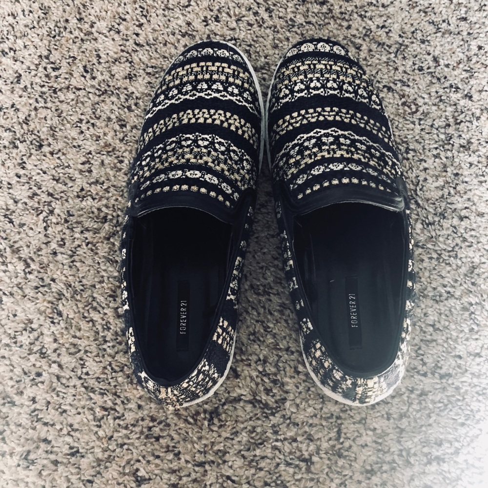 Gold and black slip on shoes